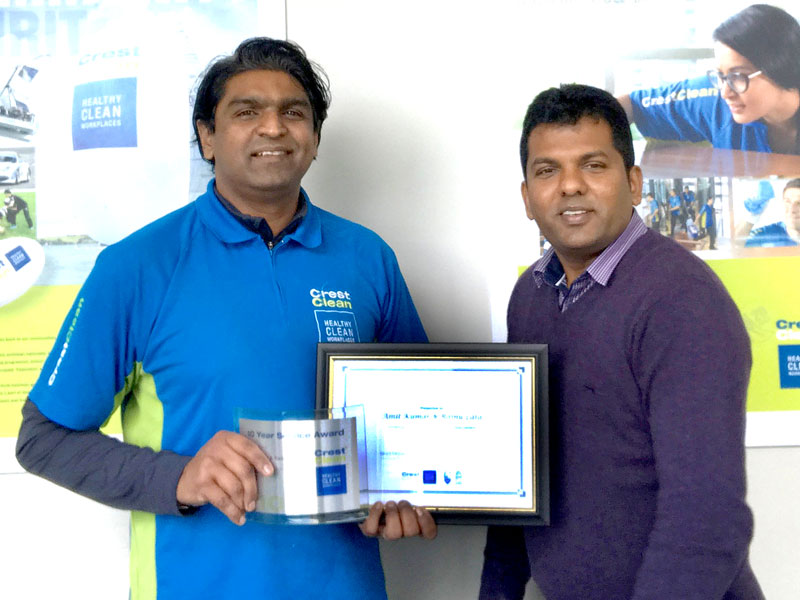 Amit Kumar receives his Certificate of Long service from Viky Narayan, CrestClean’s South and East Auckland Regional Manager.