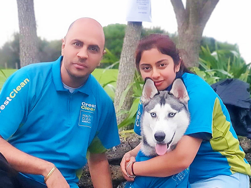 Cleaners with their dog.