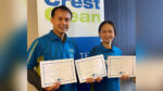 Cleaners proudly holding certificates.