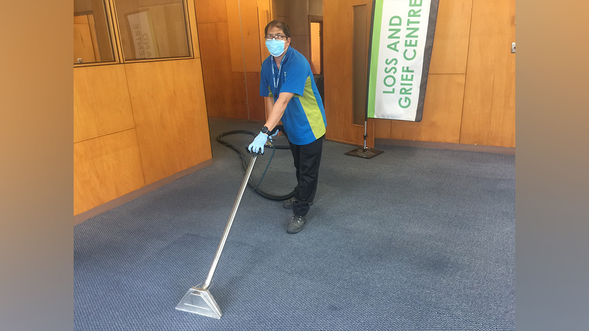 Cleaner using a carpet cleaning machine.