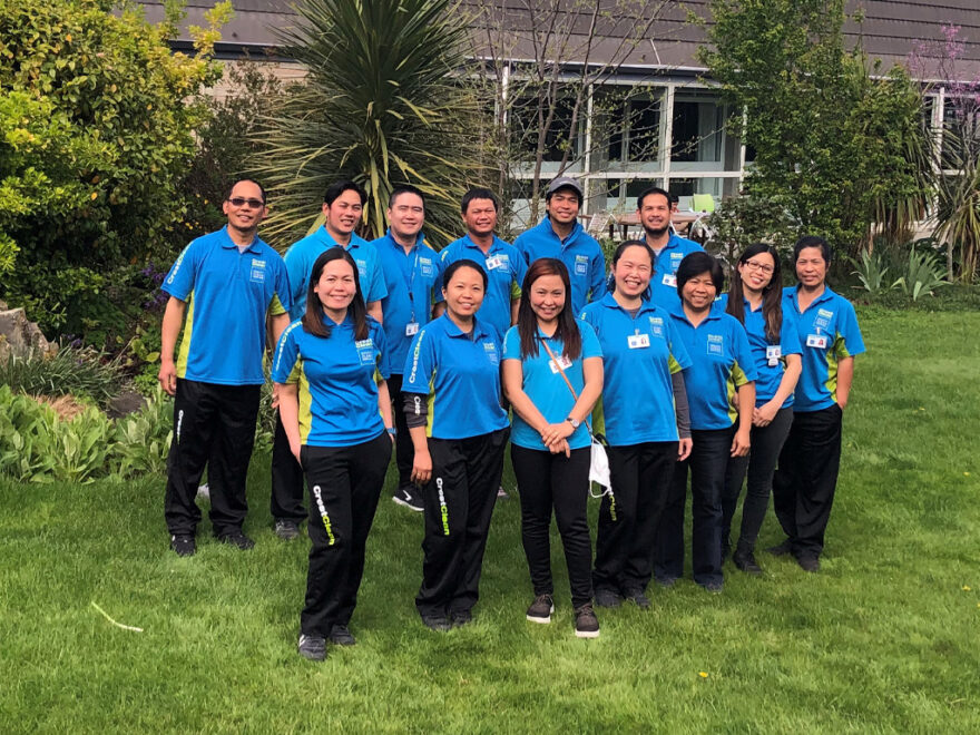 Group of cleaners standing together.